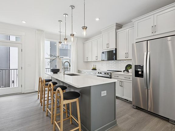 Upgraded kitchen with two-toned cabinets
