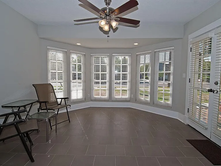 Turret with wood blinds