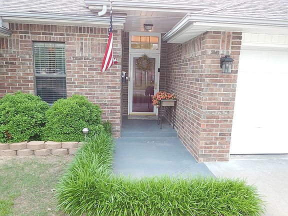 Landscaped beautiful entry.