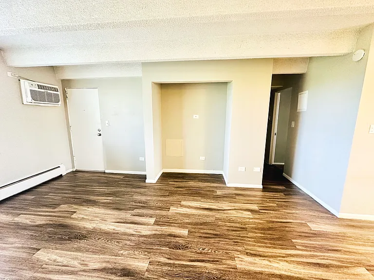 Discover this inviting living space featuring sleek wooden floors and neutral tones. Discover this inviting living space featuring sleek wooden floors and neutral tones.