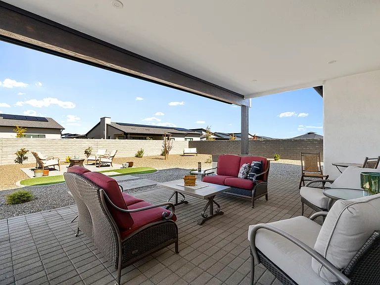 Back yard, large covered patio, paver seating area