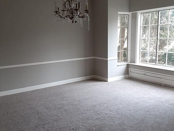 large formal dining room, new carpet, large bay window with marble window seat