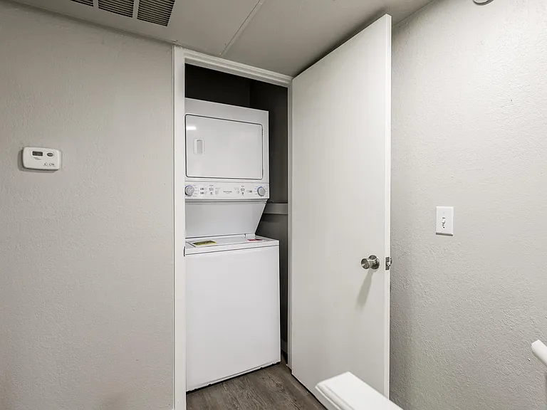 Laundry area at top of landing.