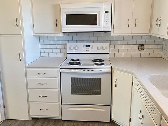 Updated Kitchen- quartz countertops and subway tile backsplash