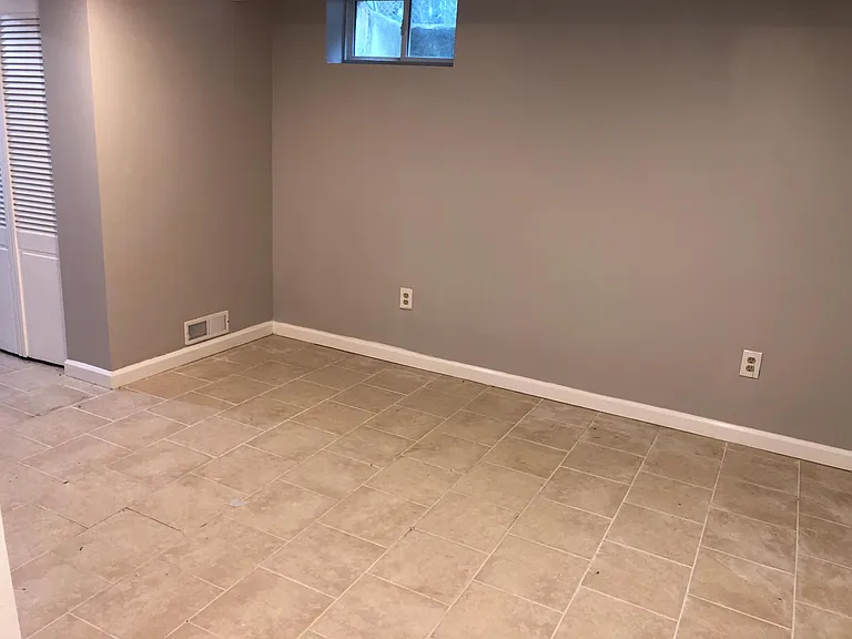 finished basement studio apartment for bed and living room
