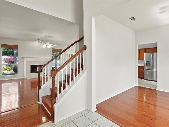 Wood floors through out the entire downstairs excluding entry, kitchen and bathrooms!