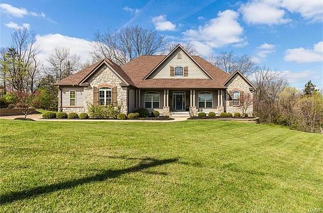 Welcome home to this gorgeous, palatial ranch-style property in the heart of the Carman Road area!