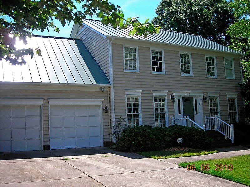 House with new metal roof in 2010