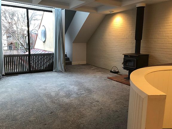 Living room (14X14) with wood burning stove.