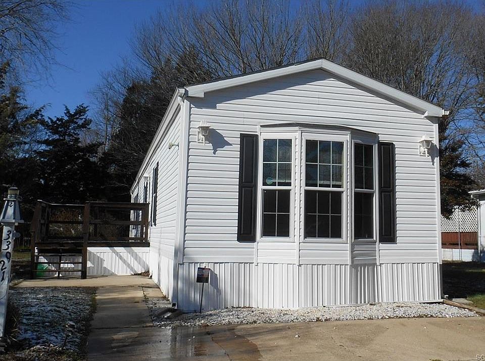 Front of home.  Ample off street parking. Large side deck.