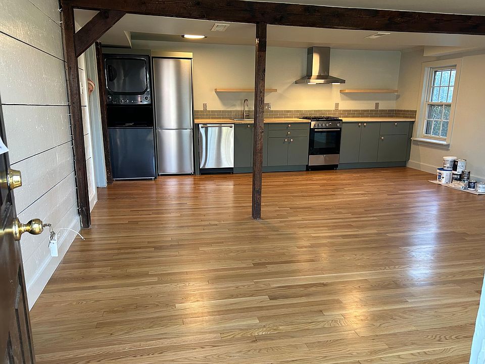 Entry way view into the living space and kitchen area.