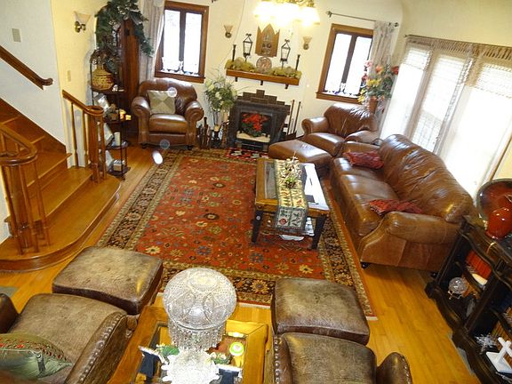Formal, yet comfortable Living Room. : 9' cove ceilings, hardwood floors, stain glass windows, two s