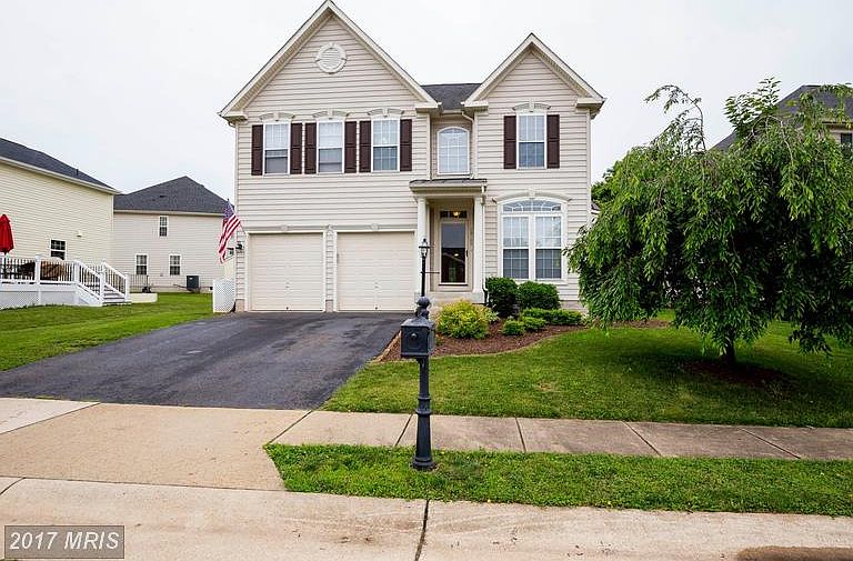 Fron load 2 car garage colonial
