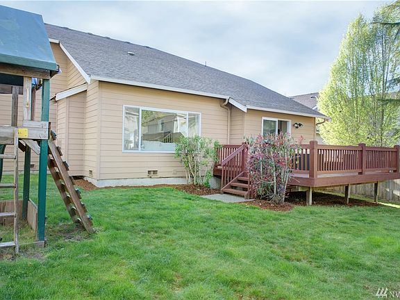 Fully fenced yard with playset included to stay