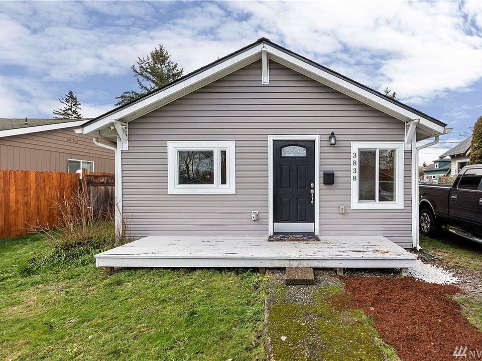 Front of Home with parking onside.