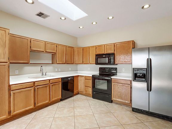 5th image of 9047 W Port Royale Ln
