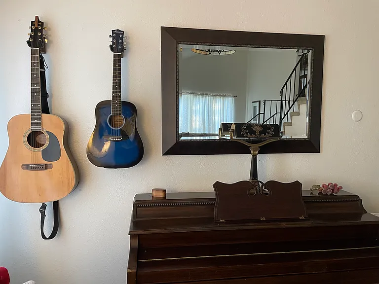 Piano, great light, cathedral ceilings, guitars, huge windows, lots of space.