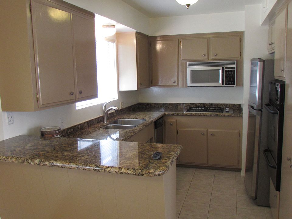 Kitchen with granite and stainless