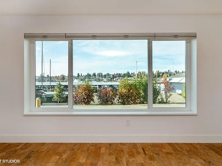 Wonderful, light-filled living room and kitchen, with views of the marina