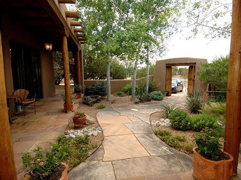 The front and rear portals create perfect outdoor spaces in which to entertain.