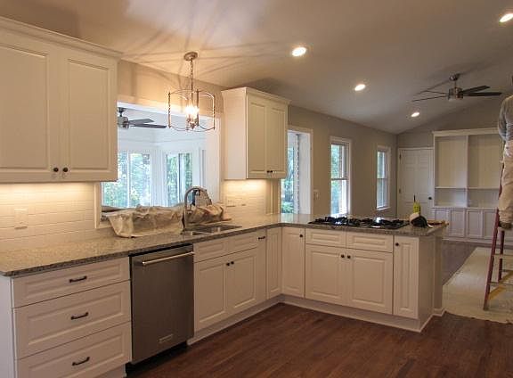 Open Kitchen and Family Room - Both vaulted ceilings with acess to sunroom.
