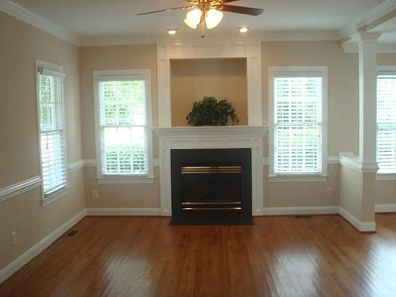 Family room w/hardwoods and custom trip