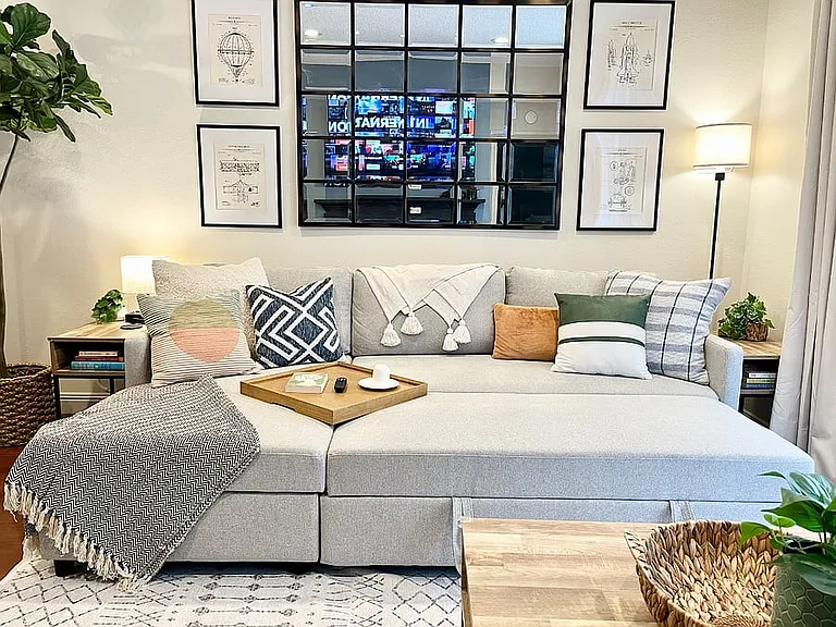 New Pottery Barn slipcovered sectional that converts to a large chaise for cozy movie nights.