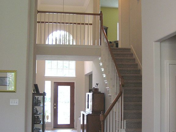Dramatic tow story entry & staircase