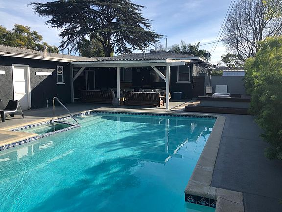 Heated pool with a spa.