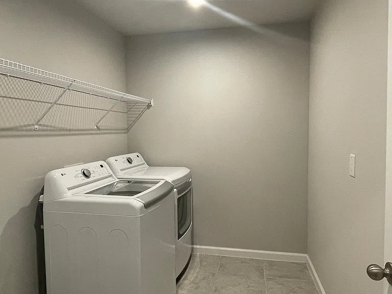 Laundry room located upstairs