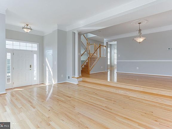 Gleaming Hardwood Floors In Living and Dining Room