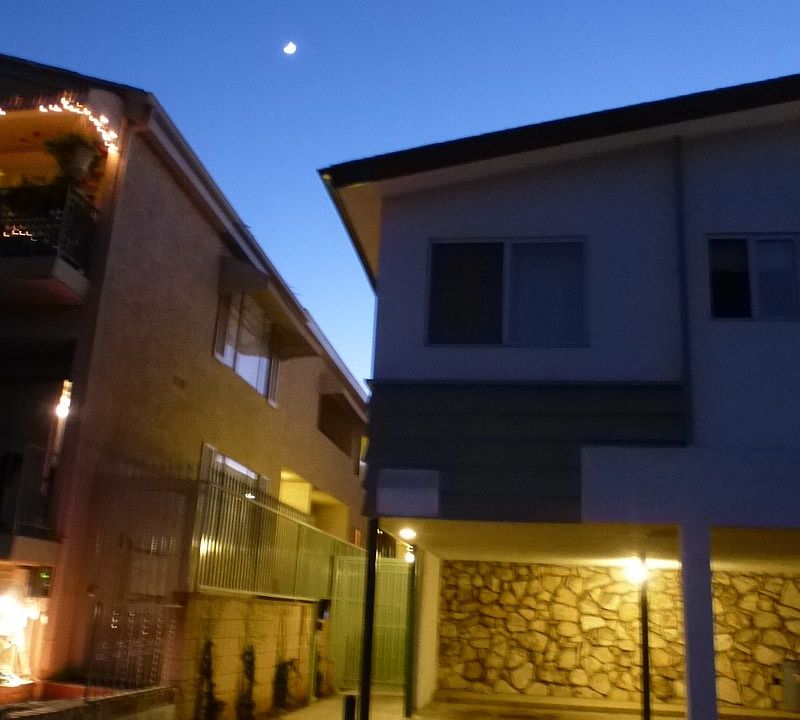 Moon over the entryway to 484 9th