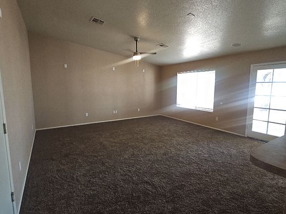 Large family room with plenty of light!