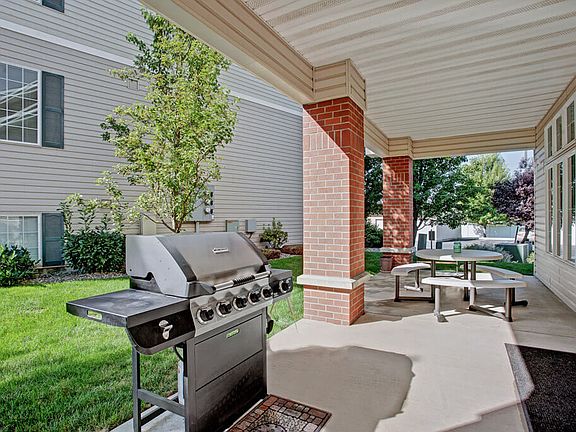 A barbeque and patio table for resident use
