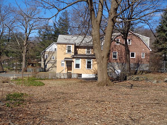 Looking from large deep yard towards house