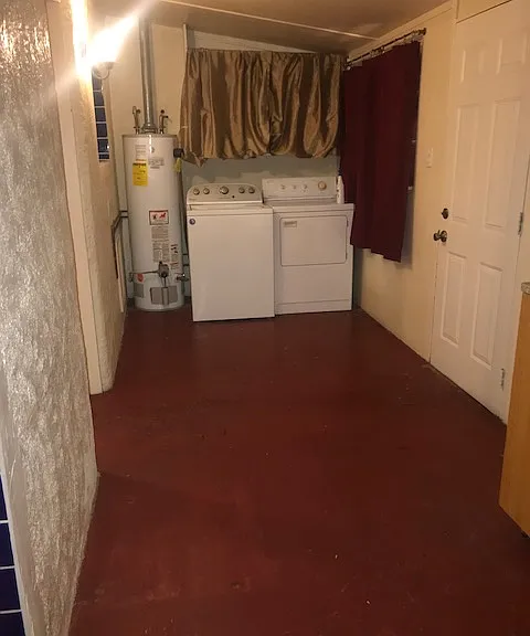 Back room with washer and dryer.