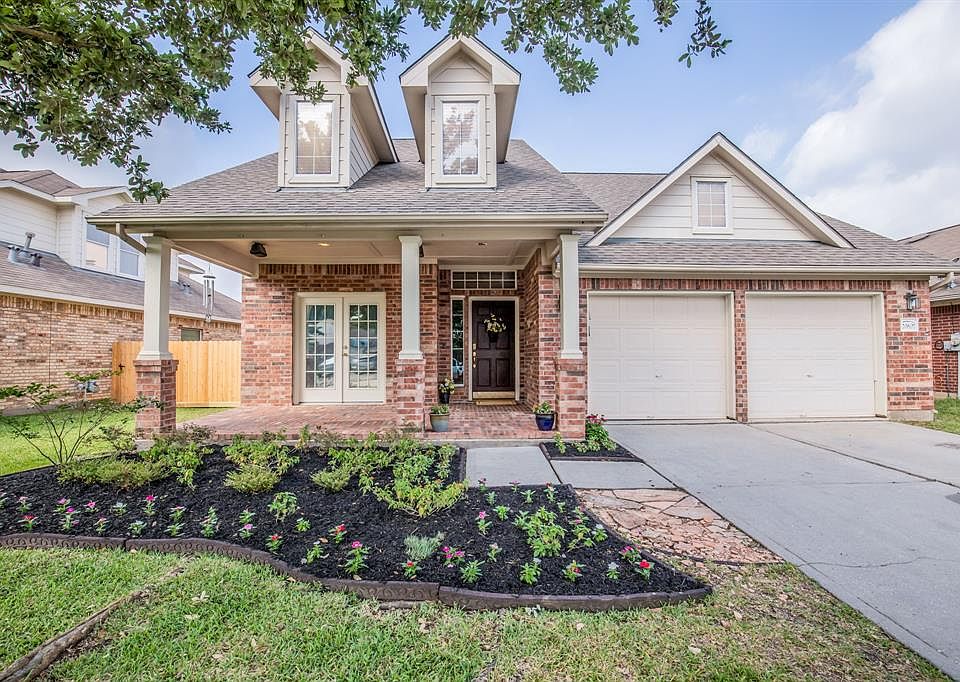 WELCOME to 20607 Spring Mission Lane! This pretty 1.5 story home is beautifully maintained and updated to your heart's content.