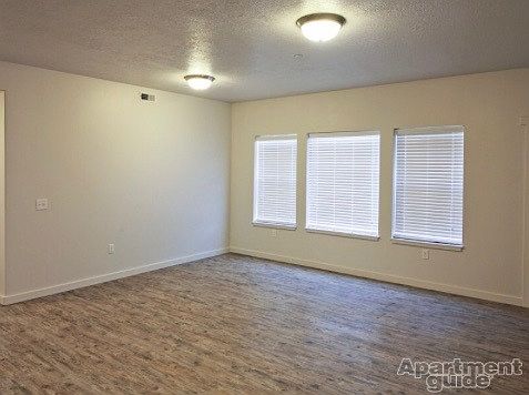 Lots of windows- Light and airy! High Ceilings!