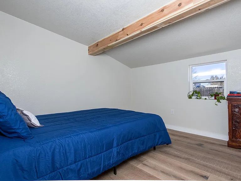 One of two bedrooms - both with queen beds.