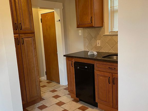 Kitchen with door to the back deck.