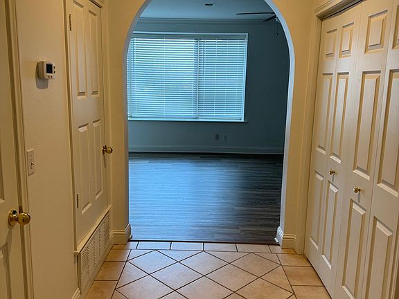 View from interior hall entrance. Laundry closet on the right.