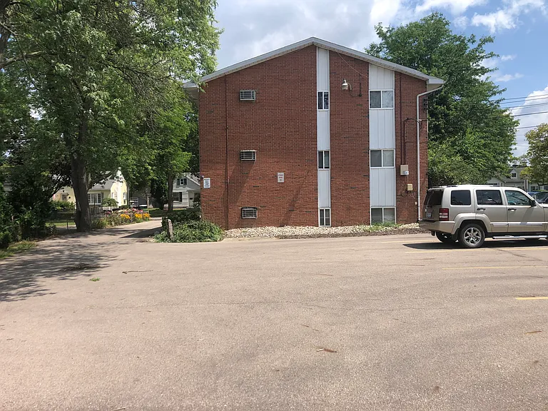 Backside of building and parking lot.