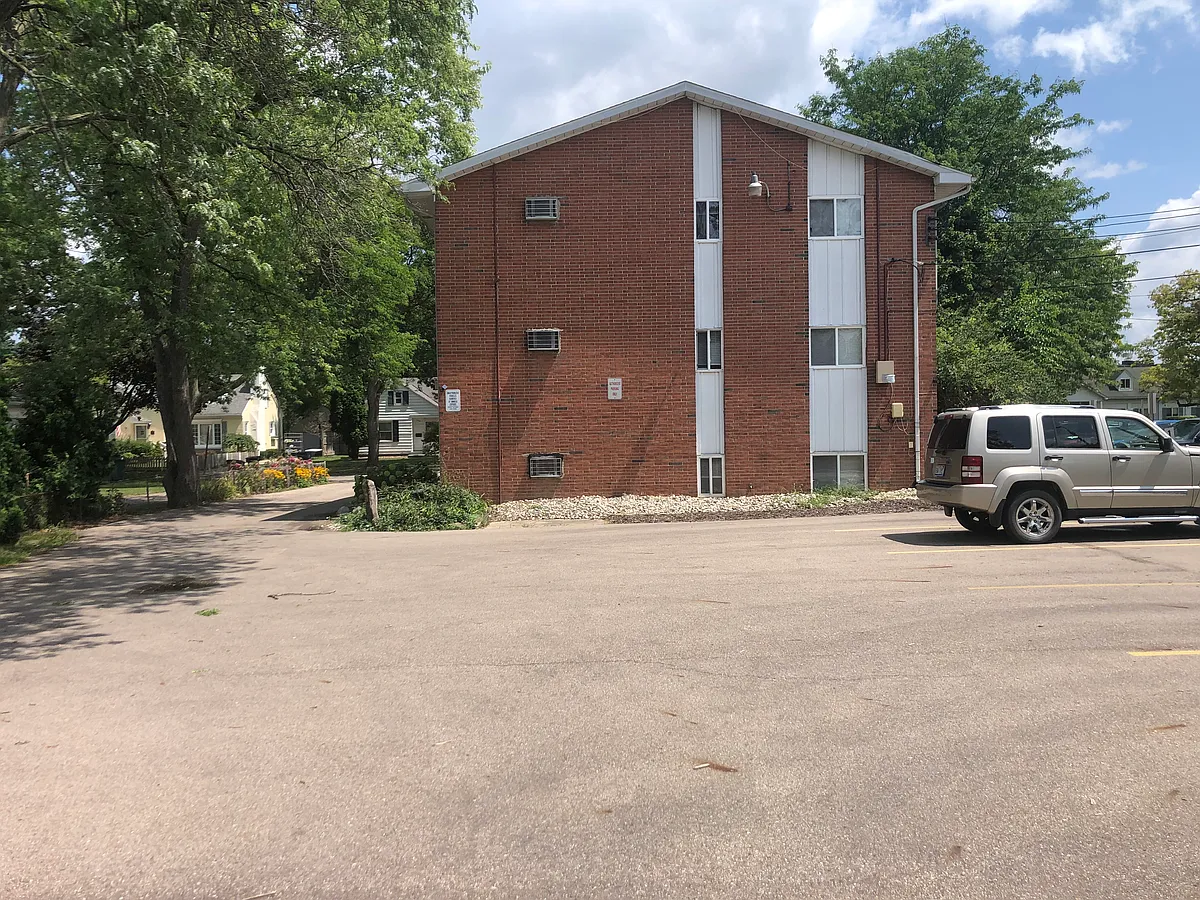Parking lot and back of building. - 141 Spartan Ave #6