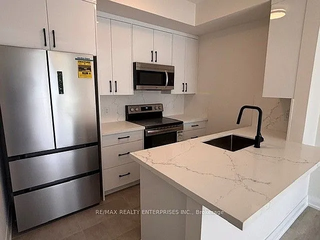 5035 Oscar Peterson Blvd #106 — Photo 2