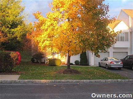 Excellent curb appeal with private driveway