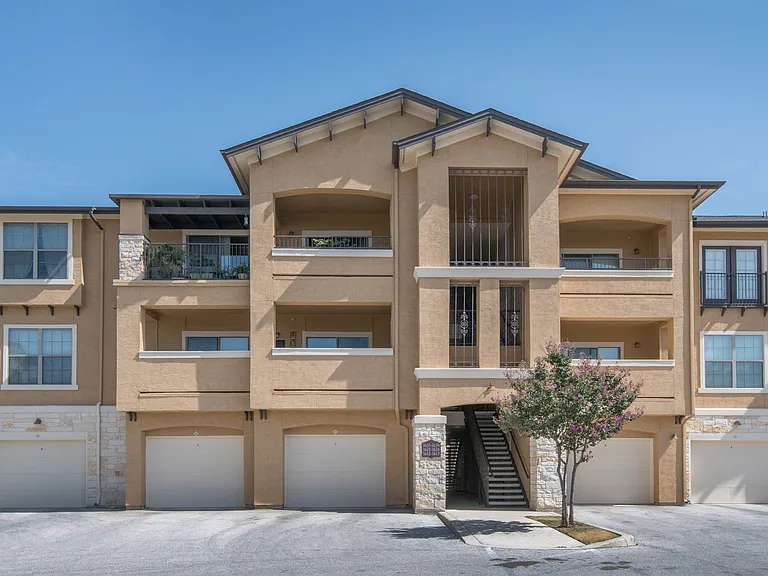 Exterior View of Buildings with Garages at Mission Hills Apartments, Texas, 78258