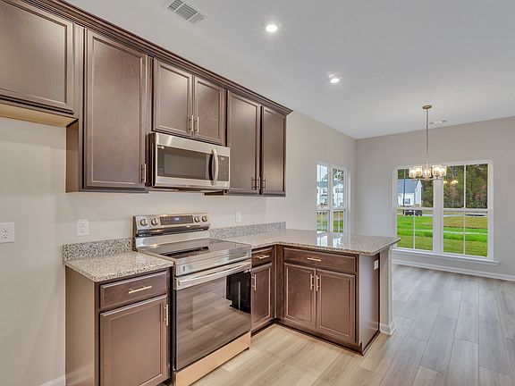 Harbor - Kitchen with Espresso Cabinets Ernest Homes