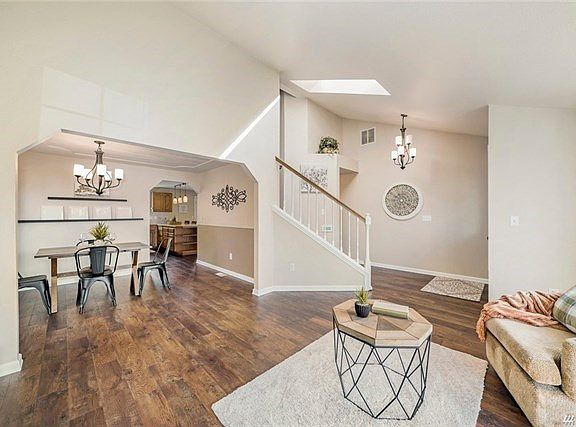 Welcome!  Entry way is open to living and dining rooms with newer laminate flooring. New light fixtures through out and well as new carpet.  Come in a stay a while.