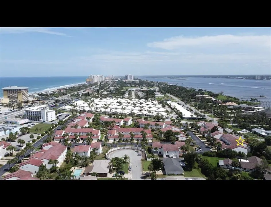 One block from the beach and the river