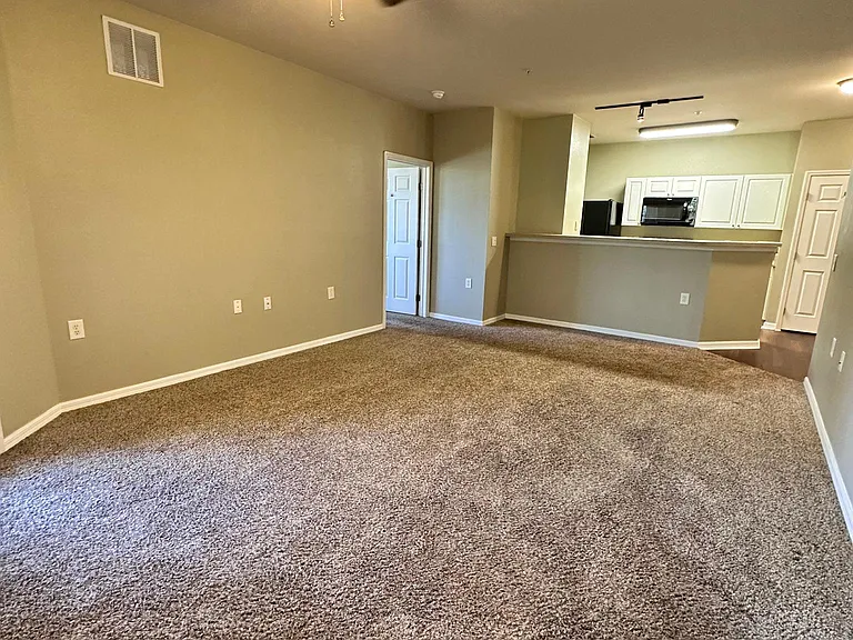 Overview of Living Room, Breakfast Bar and Kitchen